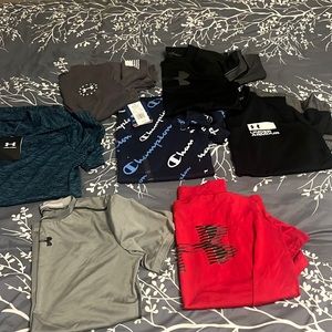 Six. Assorted boys, extra large T-shirts. Two new with tags.